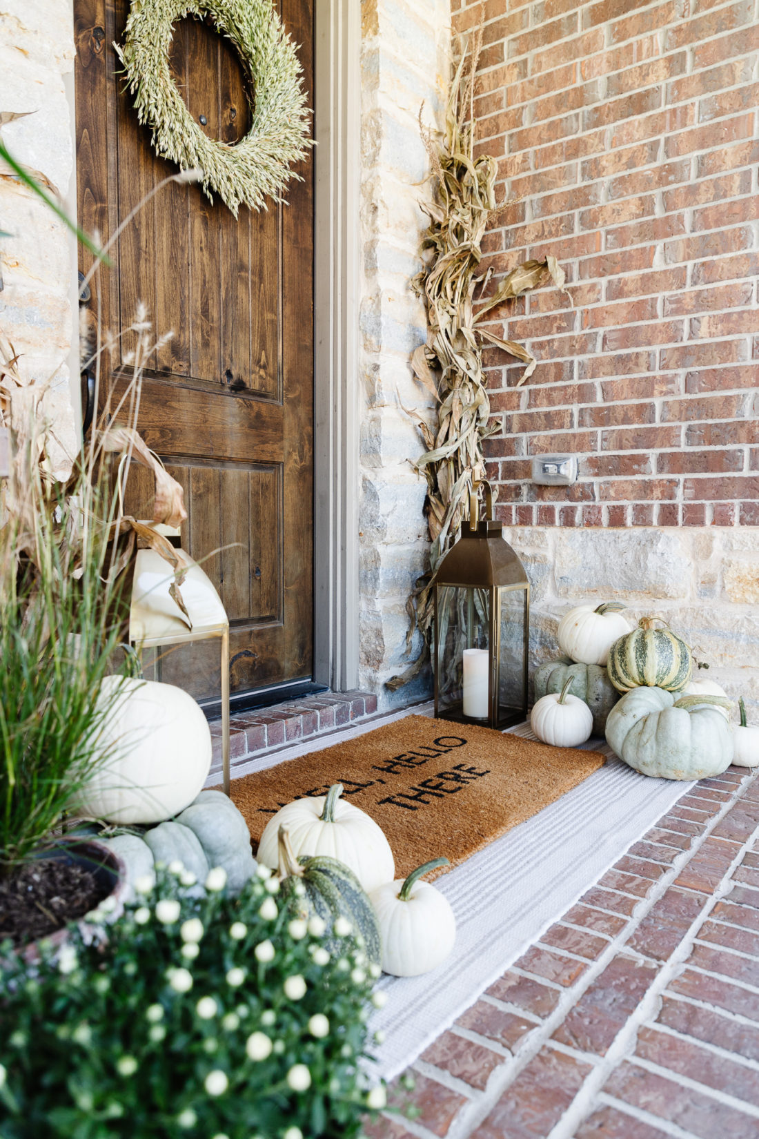 porch pumpkins and cornstalk